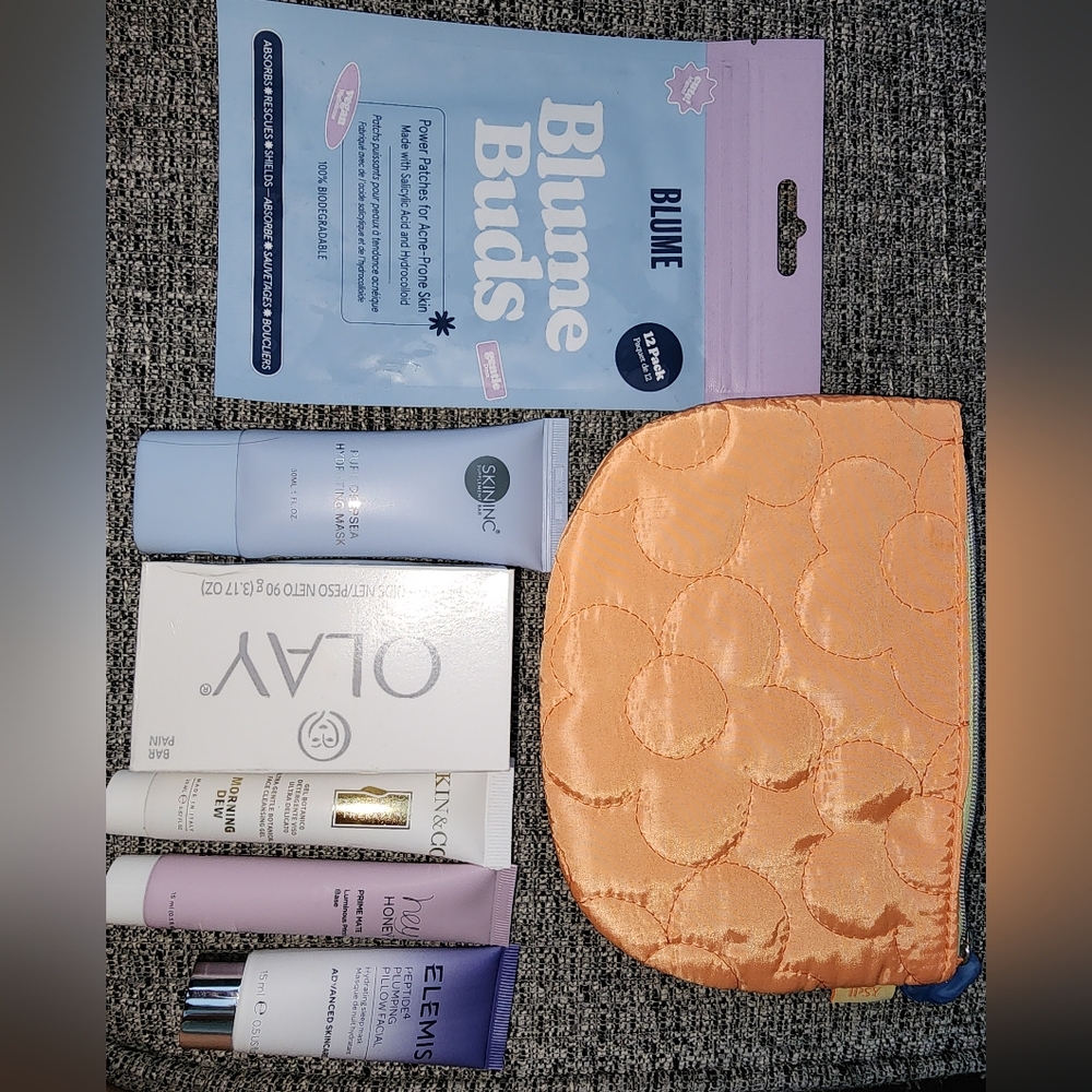 Ipsy Orange Quilted Bag with Skincare Essentials